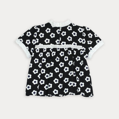 Blusa negra de flores para niña