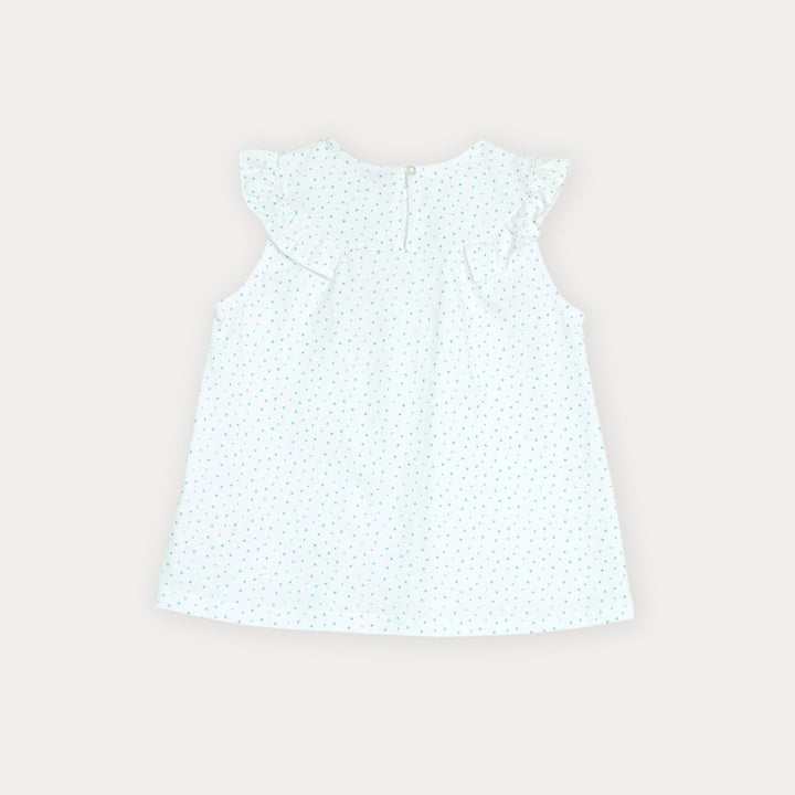 Franela blanca con estrellas para niña