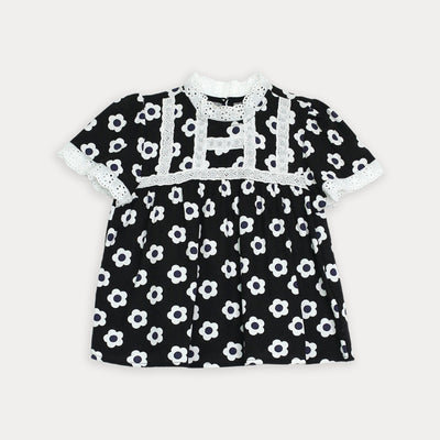 Blusa negra de flores para niña